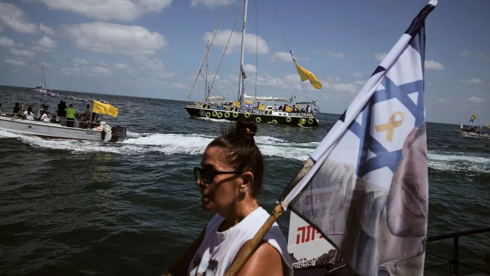 Relatives of Israeli hostages held by Hamas sail towards Gaza, calling for an end to the war. - Leo Correa/AP