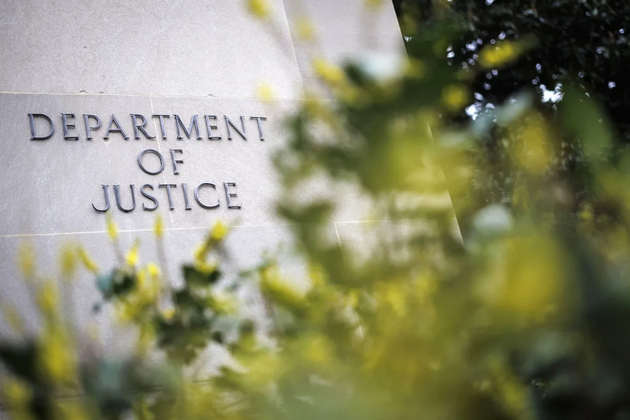 doj department of justice exterior (Ting Shen / Bloomberg via Getty Images file)