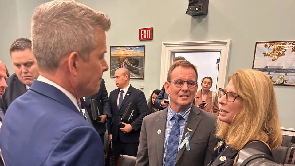 Tim and Sheri Lilley talking to Transportation Secretary Sean Duffy. - Courtesy Lilley Family