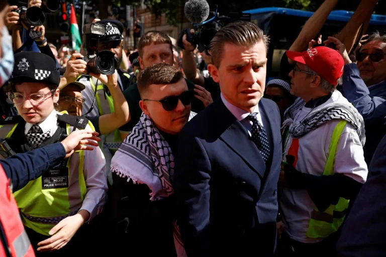 Kneecap rapper faces court on terror charge over Hezbollah flag