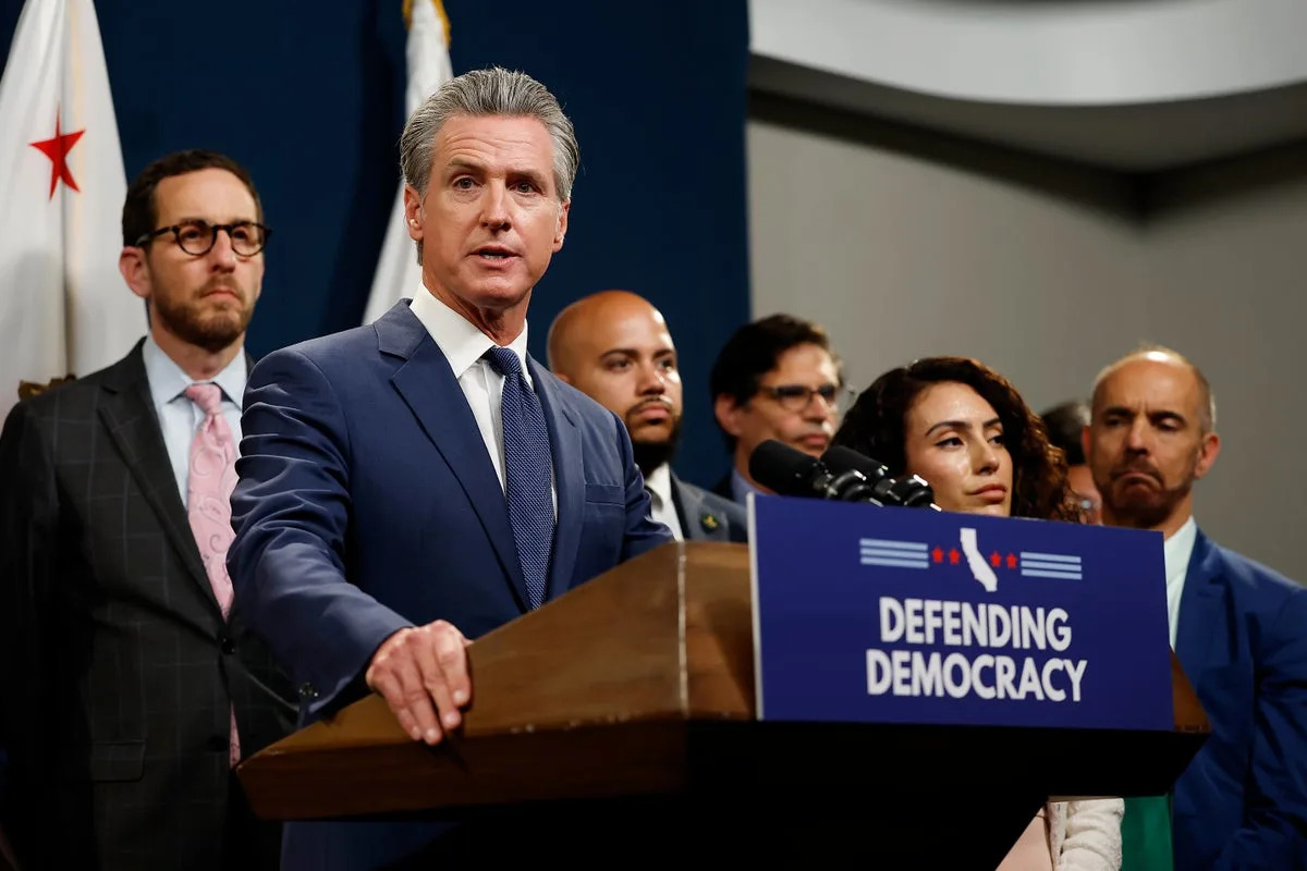 Gavin Newsom signs bill to redraw California districts in response to Texas effort to add five GOP seats
