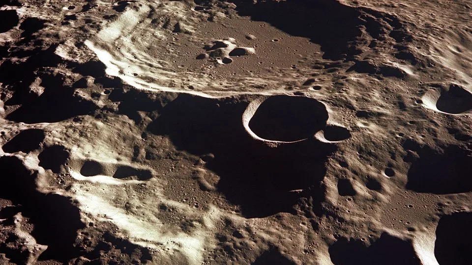 The moon is covered in craters like Daedalus, as seen by the Apollo 11 crew on the moon&#39;s far side. - NASA