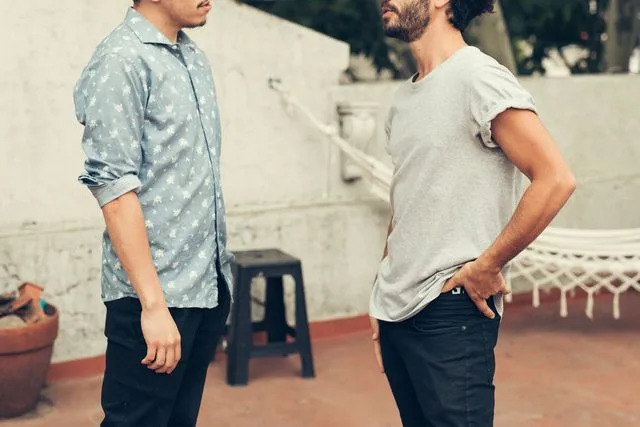 Getty Stock image of two men having a discussion