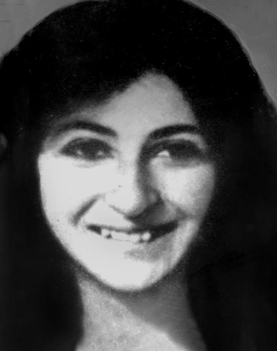 A close-up of Virginia Voskerichian smiling.