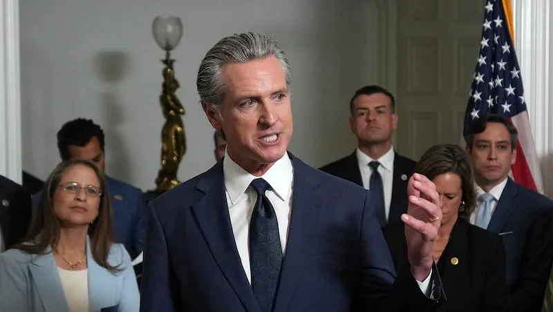Accompanied by California and Texas lawmakers, California Gov. Gavin Newsom speaks in support of the Texas Democratic lawmakers for their walk out to block a vote on a congressional redistricting plan sought by President Donald Trump, during a news conference in Sacramento, Calif., Friday, Aug. 8, 2025.