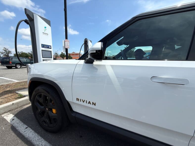 The 2025 Rivian R1S Ascend at a charging station