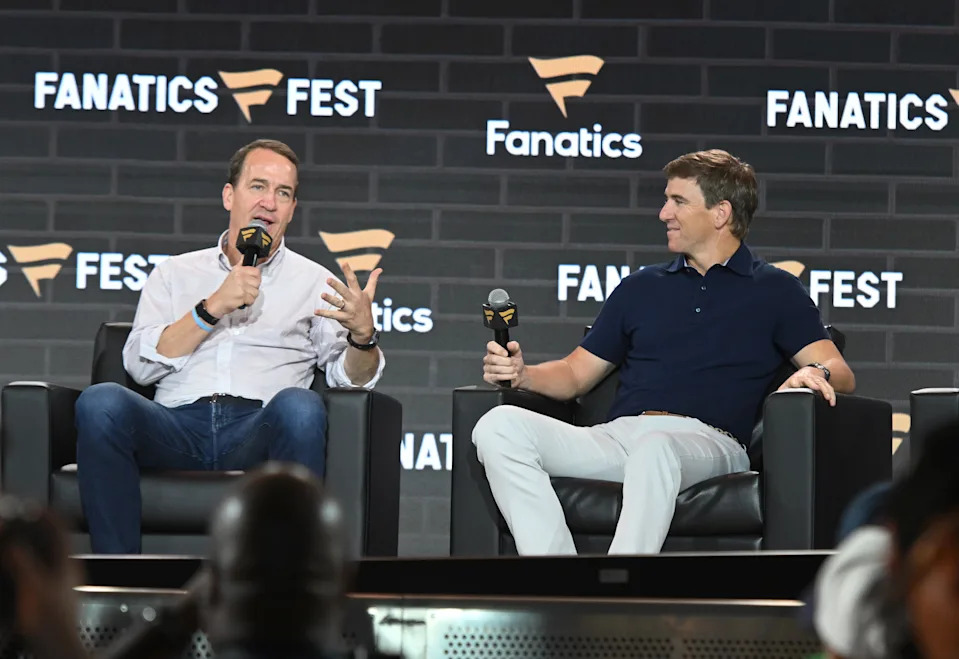NEW YORK, NEW YORK - JUNE 20: (L-R) Peyton Manning and Eli Manning speak onstage during Fanatics Fest NYC 2025 at Javits Center on June 20, 2025 in New York City. (Photo by Noam Galai/Getty Images for Fanatics)