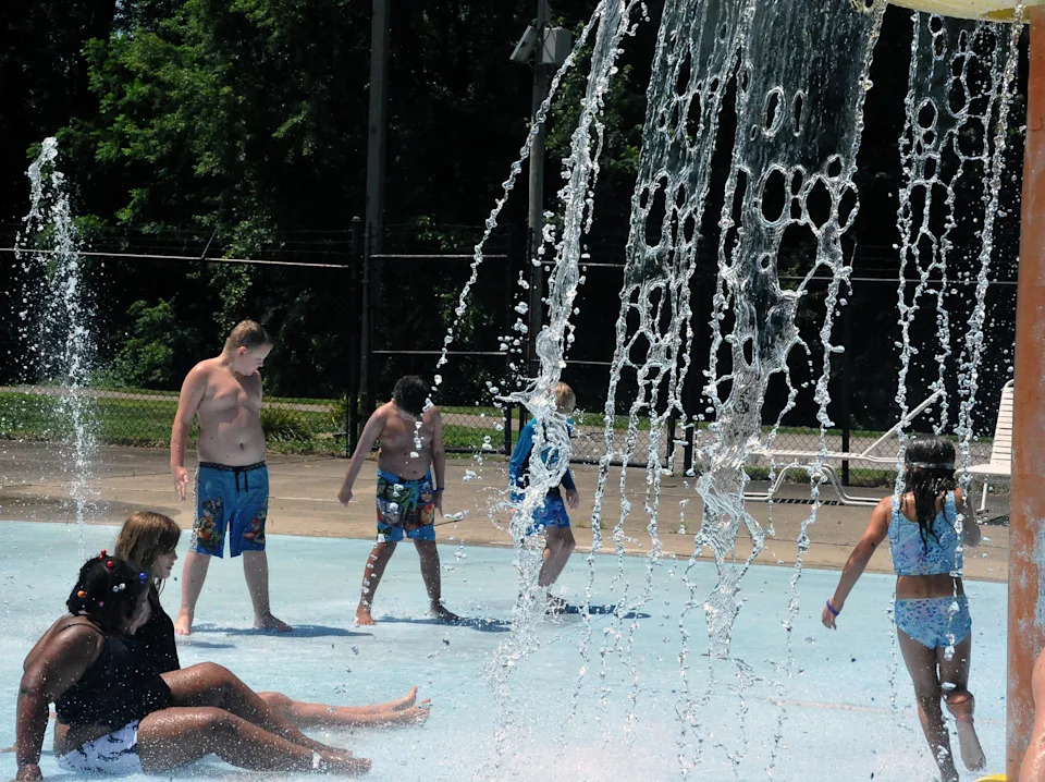 The large sprayers at Knights Field Sprayground make for a cool afternoon.