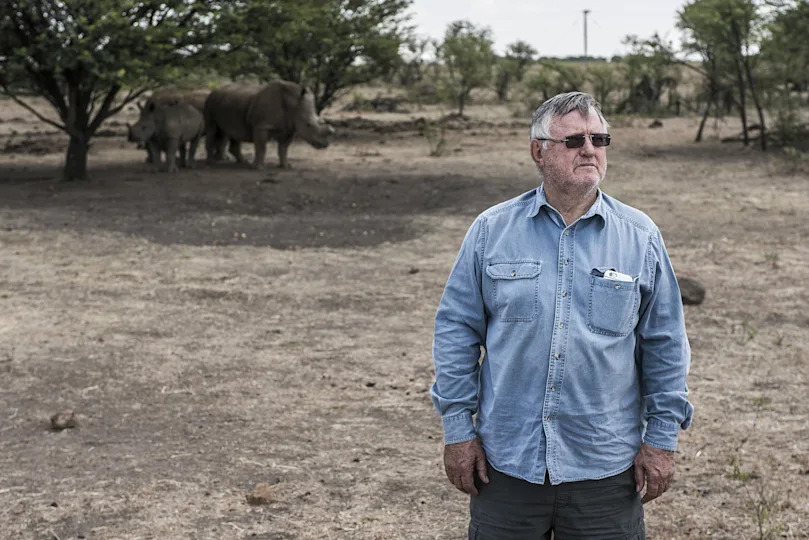 John Hume poses for a photograph on his ranch and rhino farm outside Johannesburg, South Africa, in a Dec. 4, 2015 file photo. / Credit: Waldo Swiegers/Bloomberg/Getty