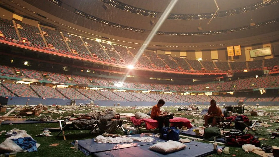 Stranded victims of Hurricane Katrina rest inside the Superdome in New Orleans, on September 2, 2005. - Mario Tama/Getty Images/File