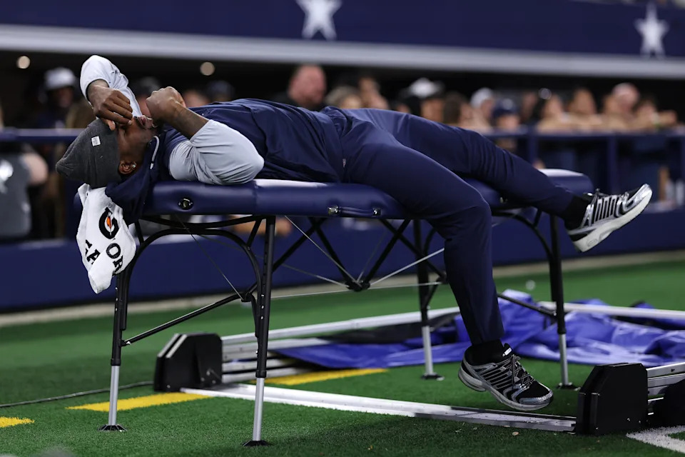 ARLINGTON, TEXAS - AUGUST 22: Micah Parsons #11 of the Dallas Cowboys lays on a training table during the second half of the NFL Preseason 2025 game against the Atlanta Falcons at AT&T Stadium on August 22, 2025 in Arlington, Texas. (Photo by Sam Hodde/Getty Images)