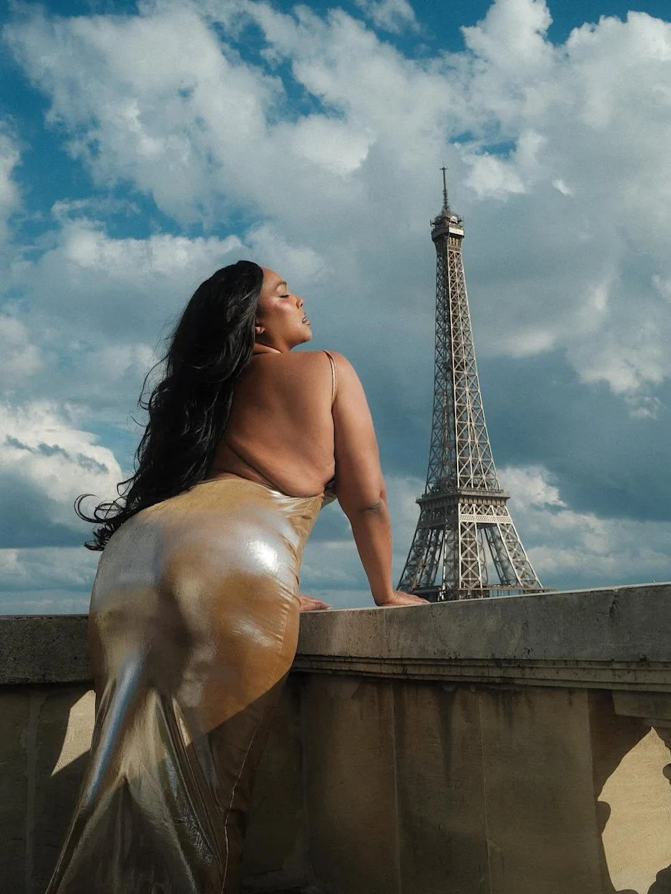 Lizzo celebrates "fat back summer"
