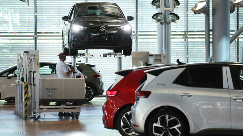 Workers assemble Volkswagen ID.3 electric cars at the Volkswagen plant on May 14, 2025 in Dresden, Germany. Volkswagen led sales of electric car sales in Germany that rose 54% overall in April compared to April of last year.