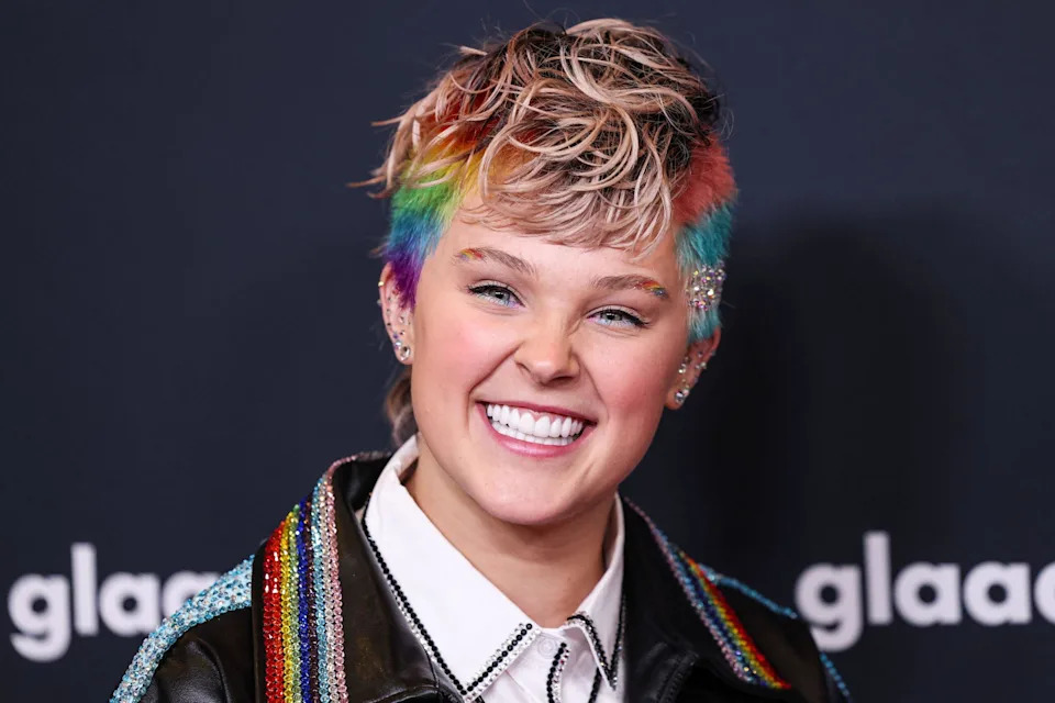 Jojo Siwa posing on the red carpet.