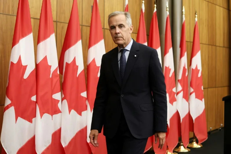 Canadian Prime Minister Mark Carney exits a press conference after announcing plans to recognize a Palestinian state (Dave Chan)