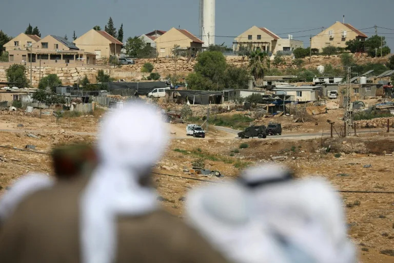 Palestinians bury activist shot dead by West Bank settler