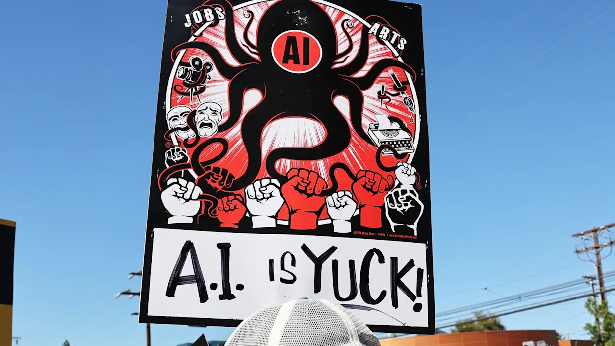 Ethical concerns – like the mistreatment of content creators decried by this protester – drive both veganism and resistance to using AI. <a href="https://www.gettyimages.com/detail/news-photo/sign-refers-to-a-i-as-striking-sag-aftra-members-and-news-photo/1739395288" rel="nofollow noopener" target="_blank" data-ylk="slk:Mario Tama/Getty Images;elm:context_link;itc:0;sec:content-canvas" class="link ">Mario Tama/Getty Images</a>