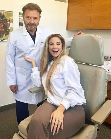 Courtesy of Ashley Alexiss Dr. Nicholas Nikolov and Ashley Alexiss.