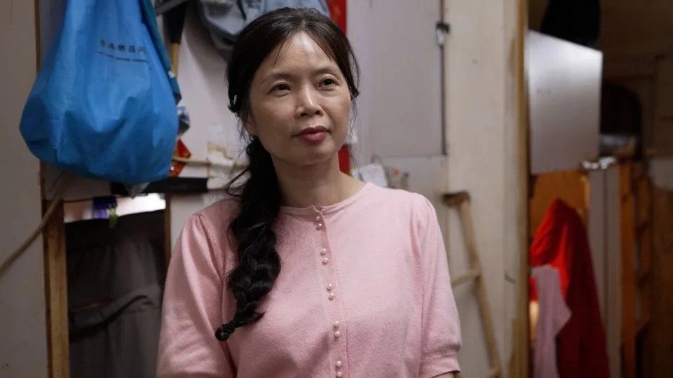 Ms. Sze at a subdivided unit in Sham Shui Po, Hong Kong, on July 3, 2025. - Dan Hodge/CNN