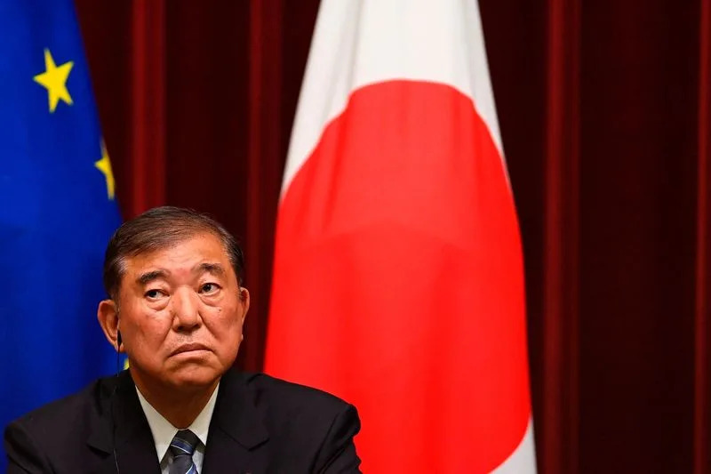 Japan's deepening political woes cloud budget, rate hike timing