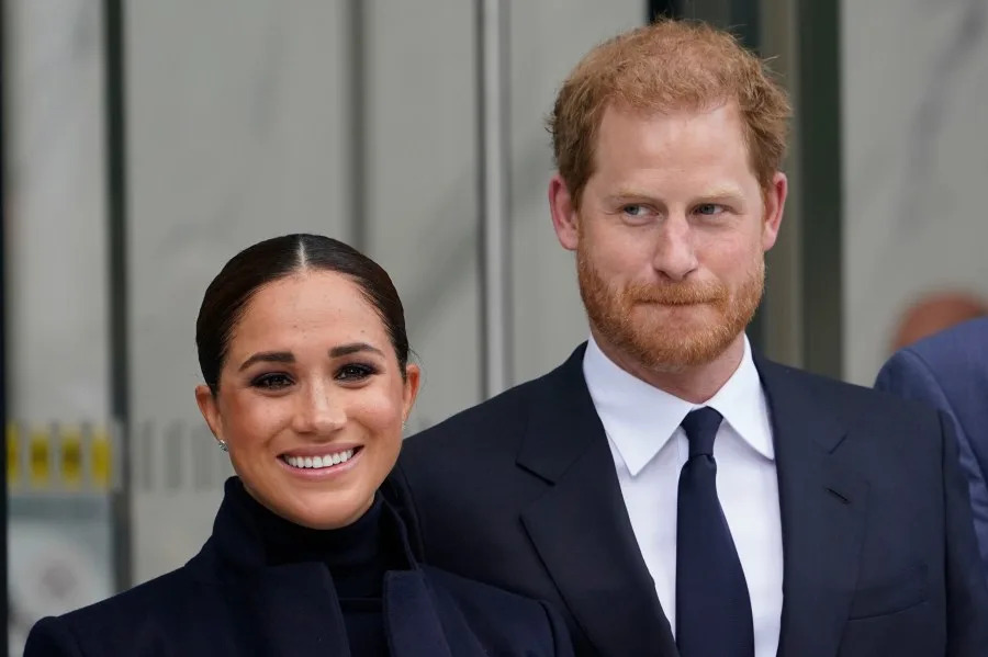 Meghan and Harry pose for photos at One World Trade in New York