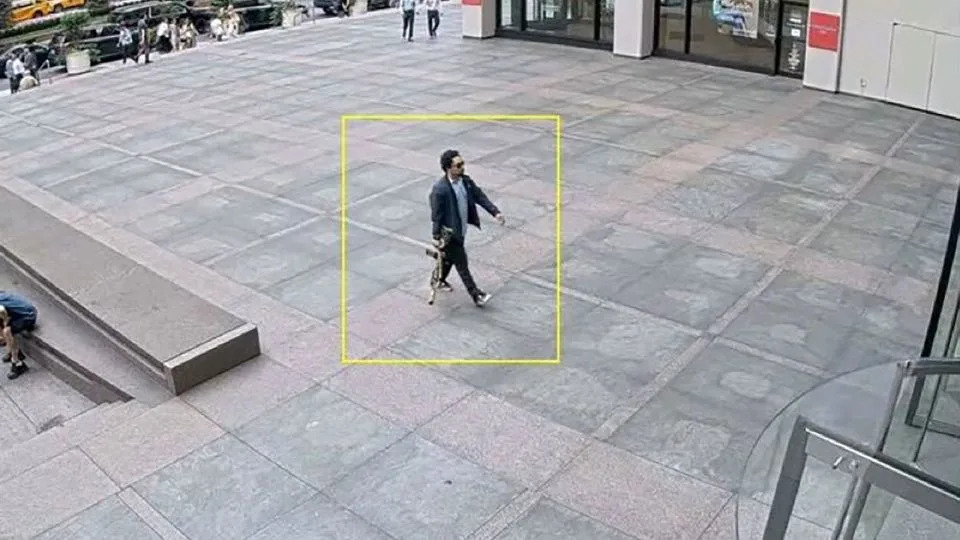 This is the photo shared by law enforcement of the man they believe to be the gunman walking into the building. - Obtained by CNN