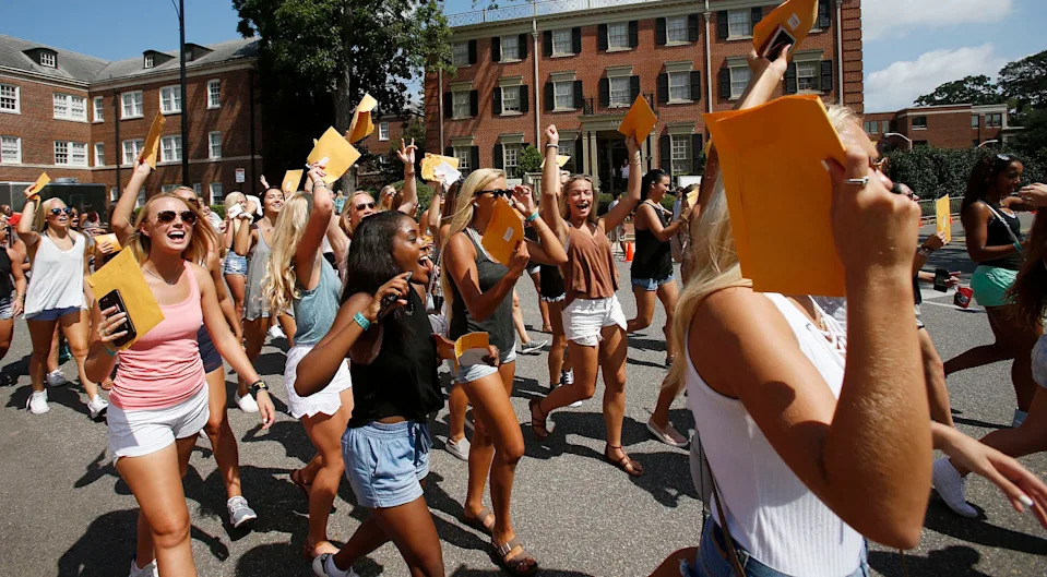 New members of sororities head to their prospective house as they leave Bryant-Denny Stadium during the University of Alabama's Panhellenic Bid Day on Saturday, Aug. 19, 2017. Of the 2,589 young women that participated in UA's Panhellenic Fall recruitment, 2,338 received bids for one of the 16 sororities during UA's annual Bid Day in Tuscaloosa.  [Staff Photo/Erin Nelson]