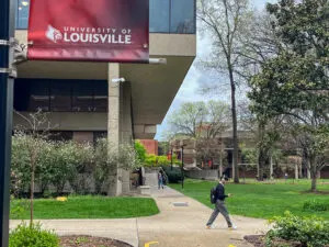  Students walk across the University of Louisville campus. (Kentucky Lantern photo by McKenna Horsley)