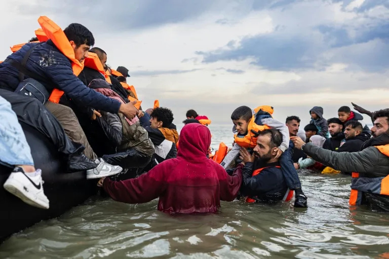 UK sees record asylum claims as row brews over housing