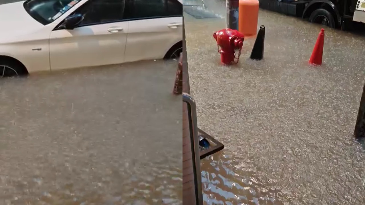 黑雨．有片｜上環海味街嚴重水浸　車輛死火停路中　水淹半個輪胎