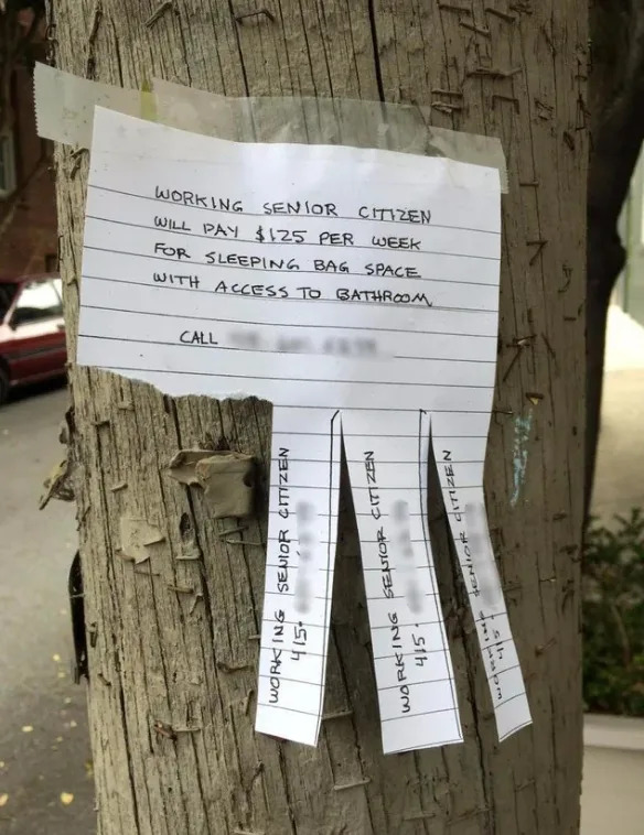A flyer on a pole offers $125/week for sleeping bag space with bathroom access for a "working senior citizen." Tear-off tabs with contact are at the bottom