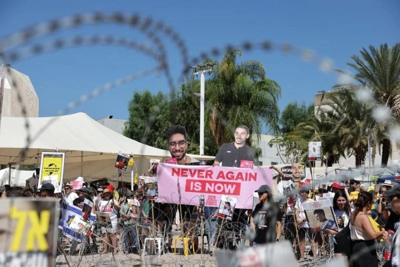 Families and supporters call for a cease-fire and a hostage release deal outside the Kirya military headquarters in Tel Aviv on Saturday. Photo by Abir Sultan/EPA