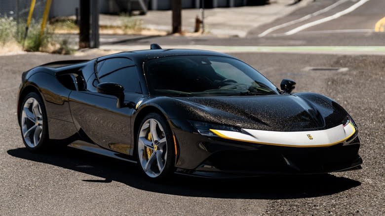 2022 Ferrari SF90 Stradale nero galaxy black paint front three-quarter