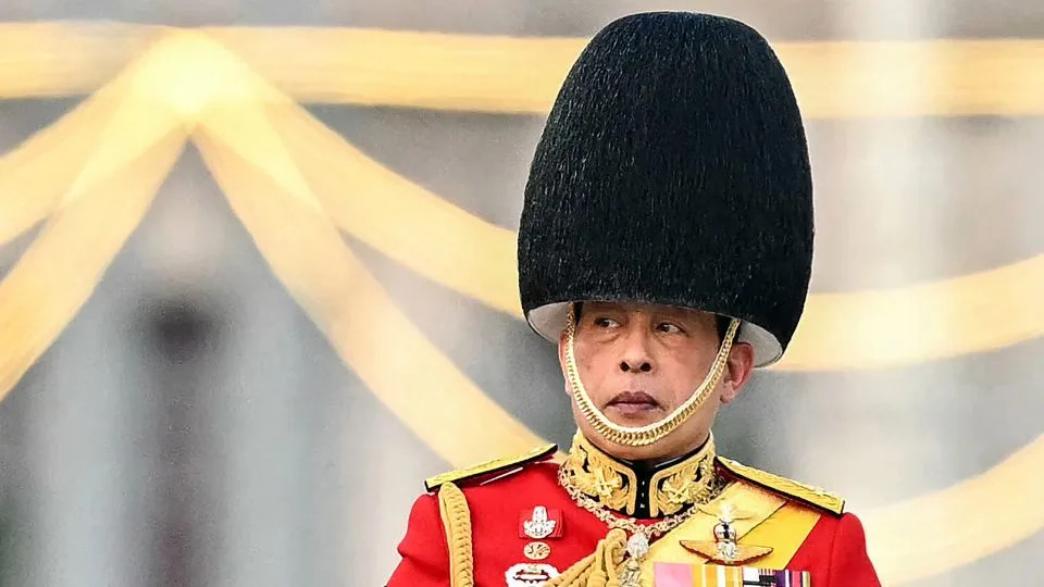 Thailand's King Maha Vajiralongkorn inspects a guard of honour to mark his 72nd birthday celebrations at the Dusit Palace in Bangkok, Thailand on December 3, 2024. - Manan Vatsyayana/AFP/Getty Images