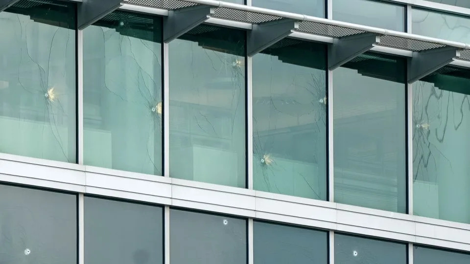 Holes were left by bullets at CDC buildings. - Elijah Nouvelage/Getty Images