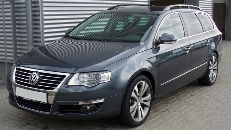A gray 2009 Volkswagen Pasat Estate parked on brick