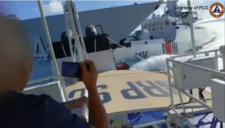 This screen grab released by the Philippine Coast Guard shows the Monday incident between a Chinese Navy vessel (L) and a China Coast Guard ship (Handout)