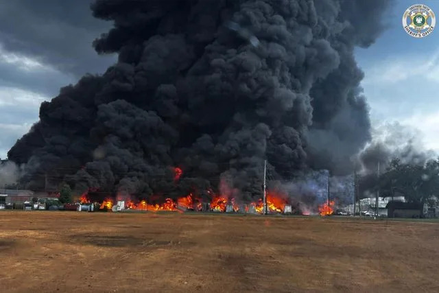 Tangipahoa Parish Sheriff's Office A view from the ground of the flames and pillars of smoke.