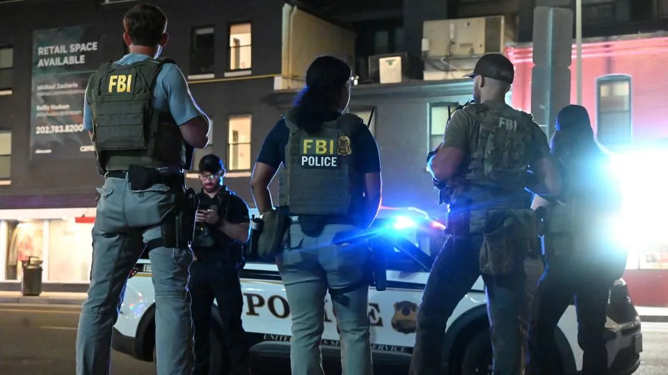 FBI agents patrol the areas of U Street in Washington, DC, on August 10. - Kyle Mazza/NurPhoto/Shutterstock