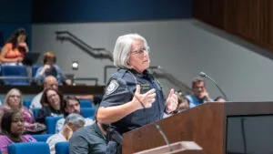  Lenexa Police Chief Dawn Layman addressed the city council during an Aug. 5, 2025, meeting. (Sherman Smith/Kansas Reflector)