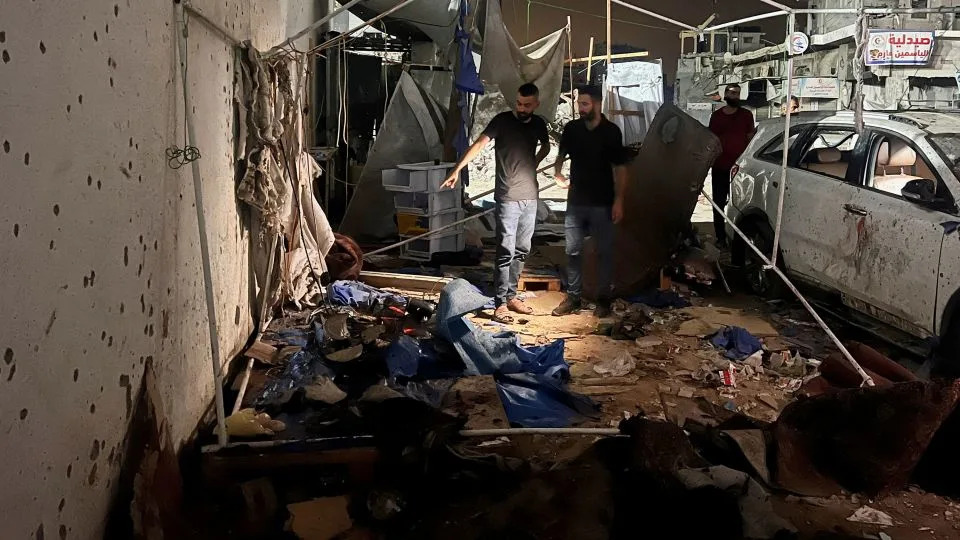 Palestinians inspect the site of an Israeli strike where Al Jazeera says its journalists Anas Al Sharif, Mohammed Qreiqeh and three photojournalists were killed, in Gaza City, August 11, 2025. - Ebrahim Hajjaj/Reuters