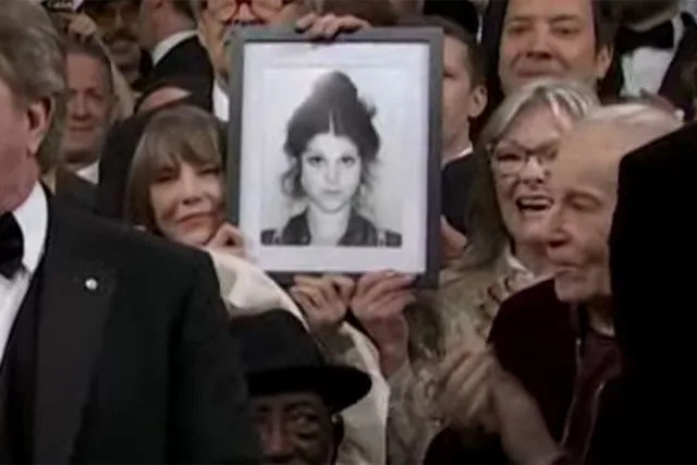NBC Laraine Newman and Jane Curtain hold up photo of Gilda Radner on 'SNL50'