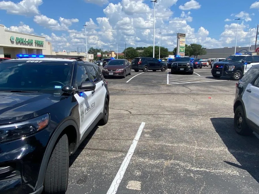 emergency personnel in parking lot