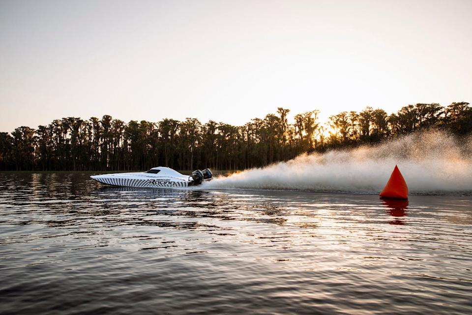 a mercury racing boat at lake x.