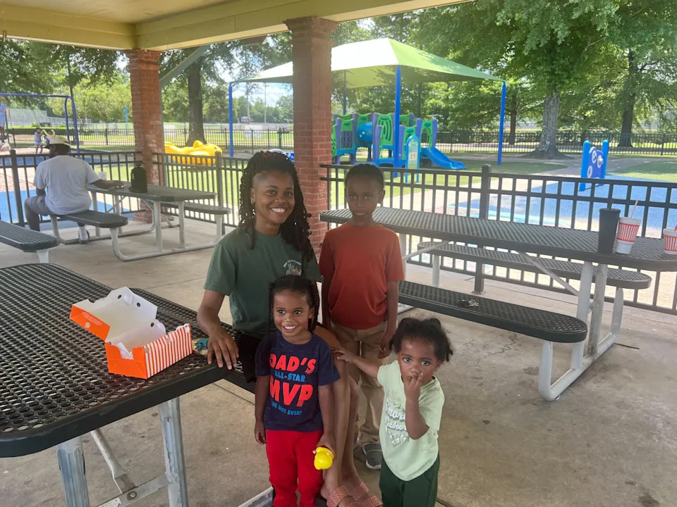 Monica Ford poses with children Tahir, 7, Kian, 4, Nuri, 1, at Freedom Ridge Park in Ridgeland, Miss., July 19, 2025. (Monica Ford)