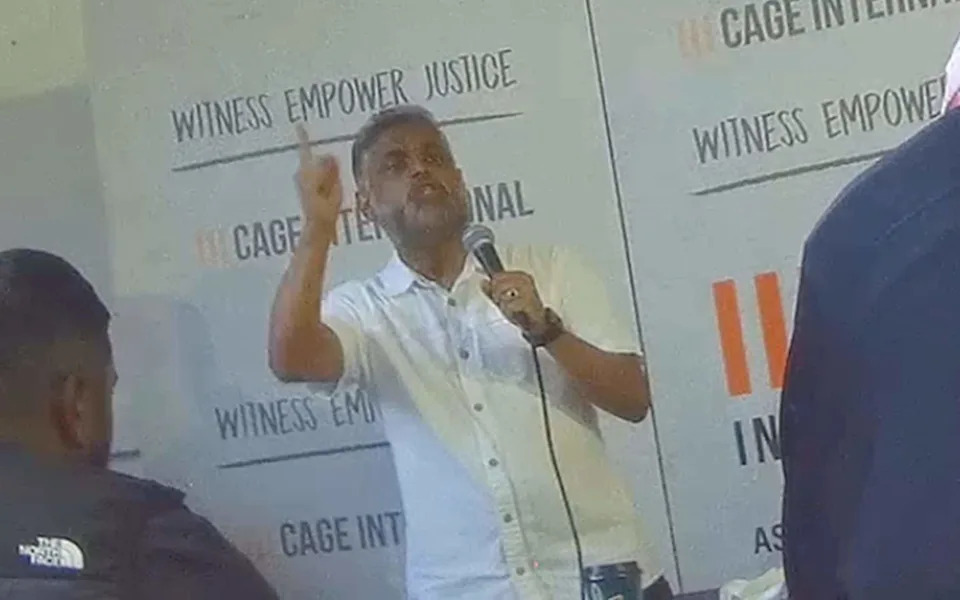 Moazzam Begg speaks at a meeting to organise protests in support of Palestine Action