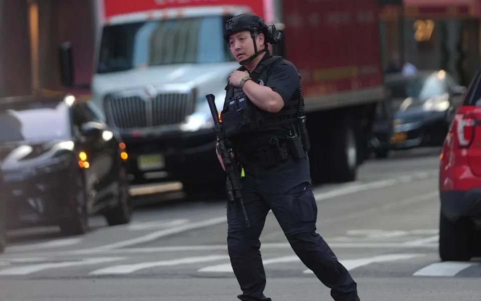 Armed police rushed to the scene on Monday evening