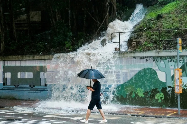 Hong Kong hit by flooding after flurry of rainstorm warnings
