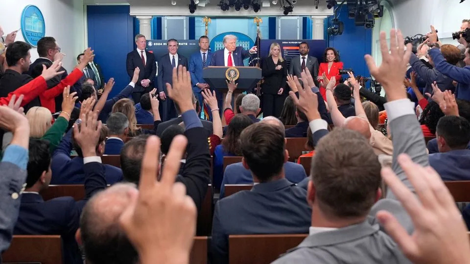 President Donald Trump speaks with reporters in the James Brady Press Briefing Room at the White House on August 11. - Alex Brandon/AP