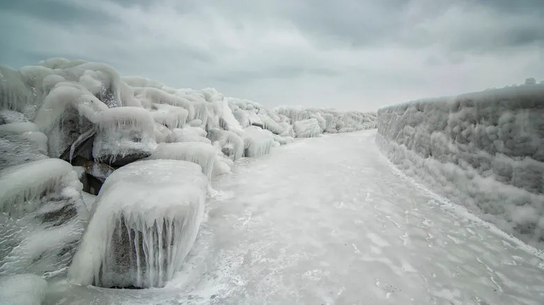 Ice covering a river and surrounding landscape